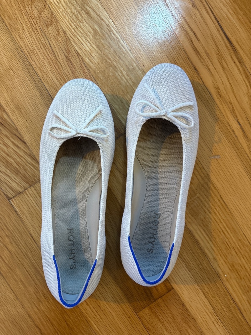 Rothy’s white flats